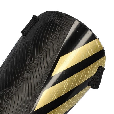 Nagolenniki Kids Tiro SG Trening Niño