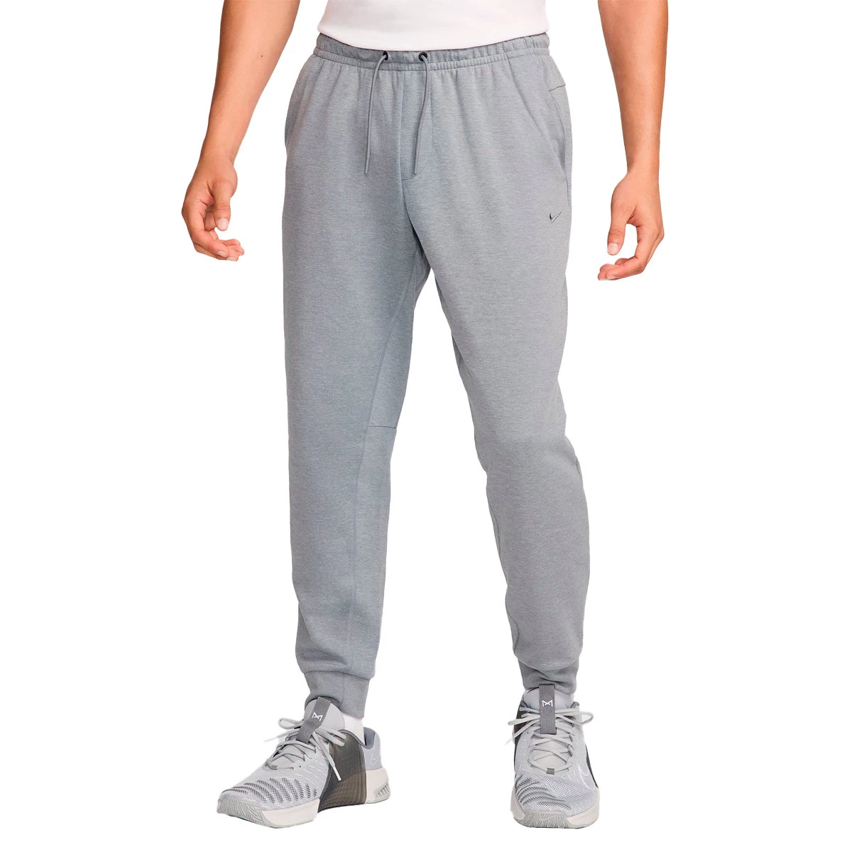 Nike - Długie spodnie Primary Jogger, Hombre, Cool Grey-Htr-(Cool Grey), M