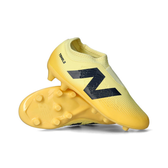Buty piłkarskie New Balance Tekela Magique FG V4+ . dla Kids