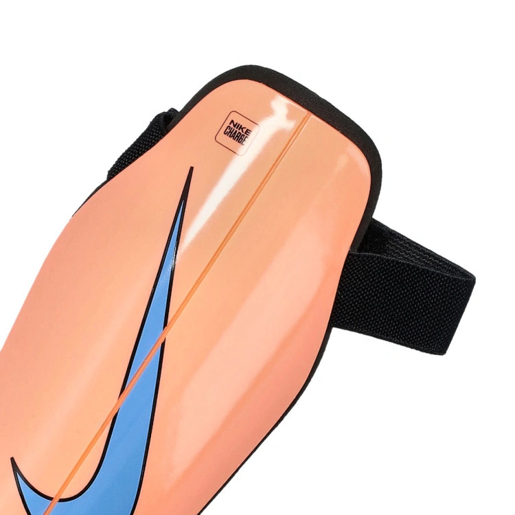 espinillera-nike-y-nk-chrg-grd-su23-naranja-1