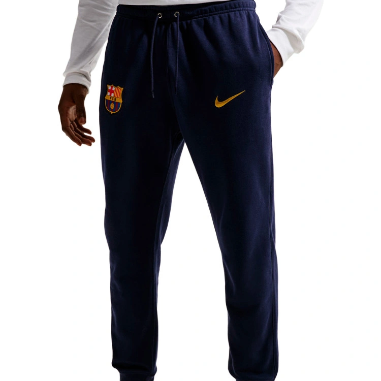 pantalon-largo-nike-fc-barcelona-fanswear-2026-2027-blackened-blue-mineral-yellow-no-sponsor-0